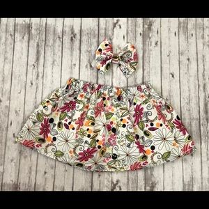 Handmade skirt with fabric bow.